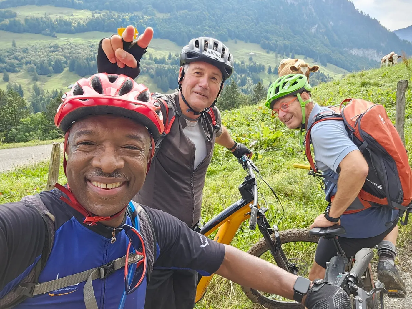 Solly Moeng with fellow cyclists on a mountain trail
