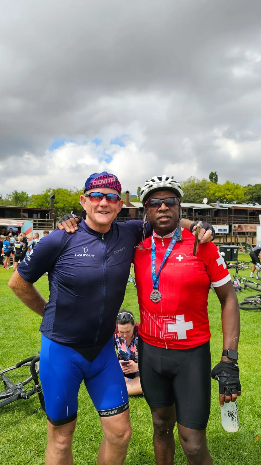 Solly Moeng with a fellow cyclist