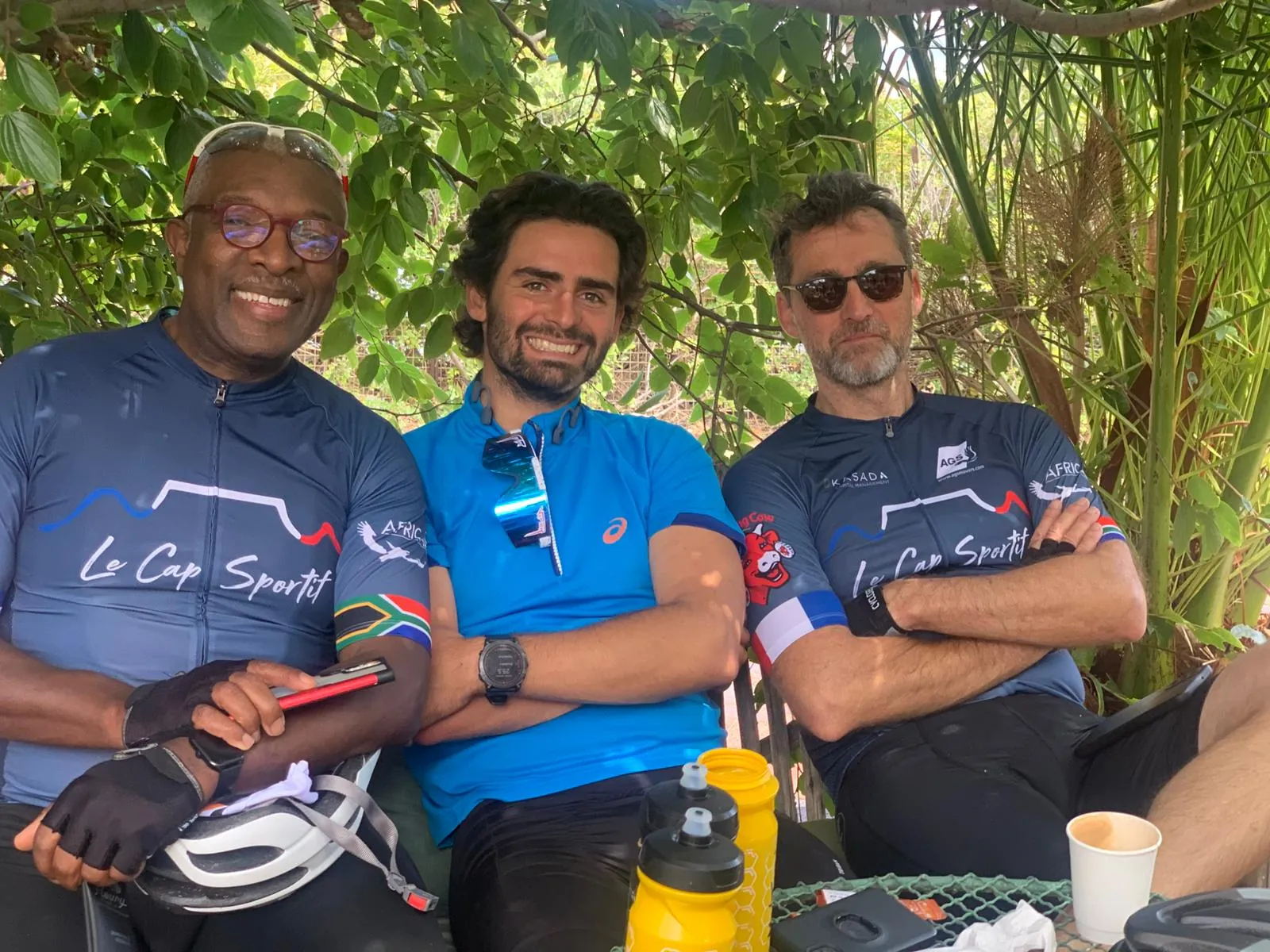 Solly Moeng with fellow cyclists during a break